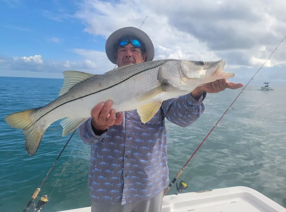 Angler with a snook