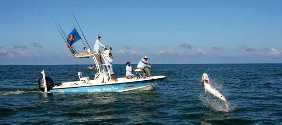 Captain Fred's EdgeWater center console running through Ponce Inlet
